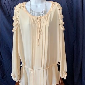 Fun cream colored blouse with side ties